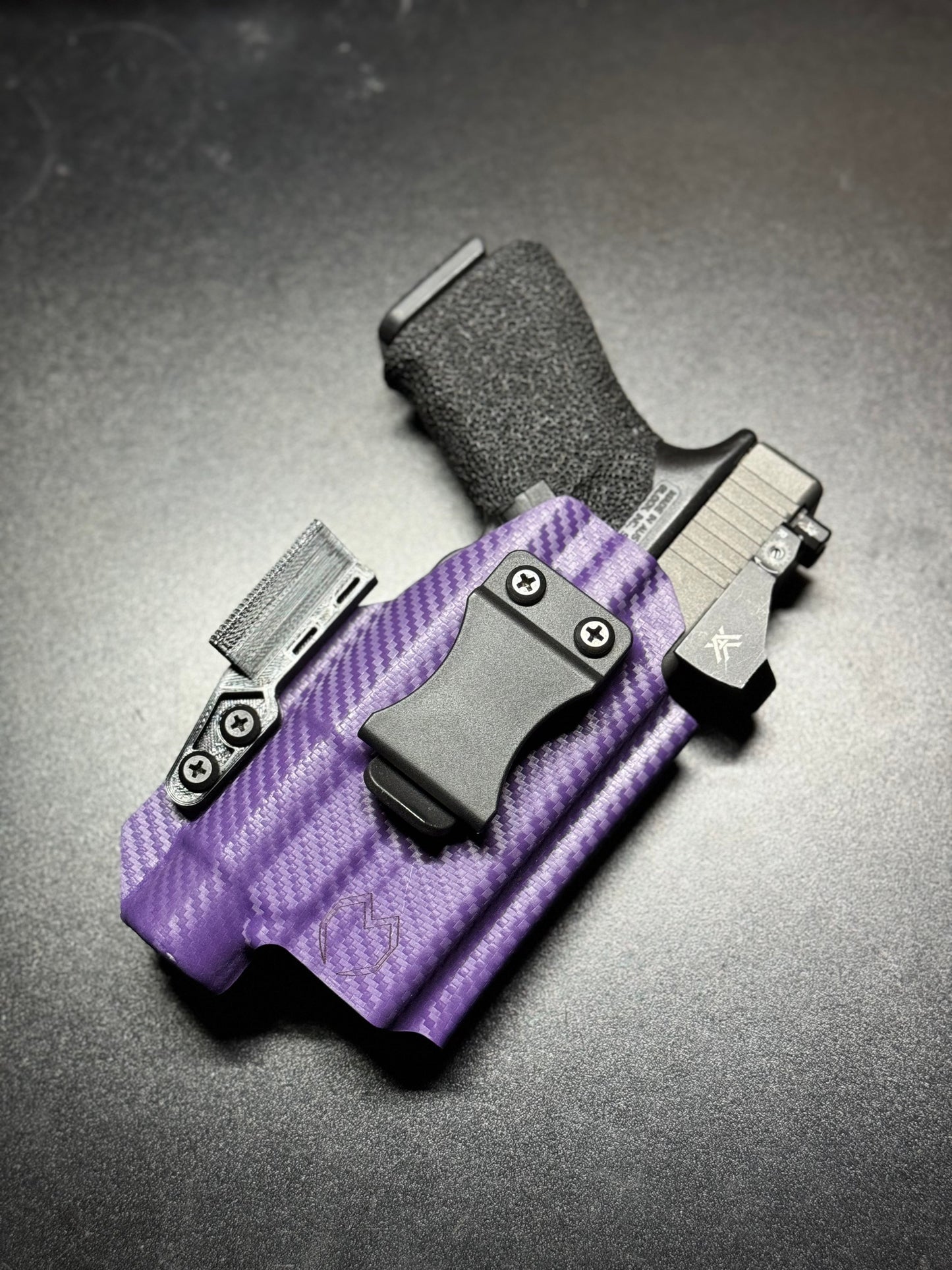 Custom-molded Kydex holster with RMR cut, compatible with popular reflex sights.